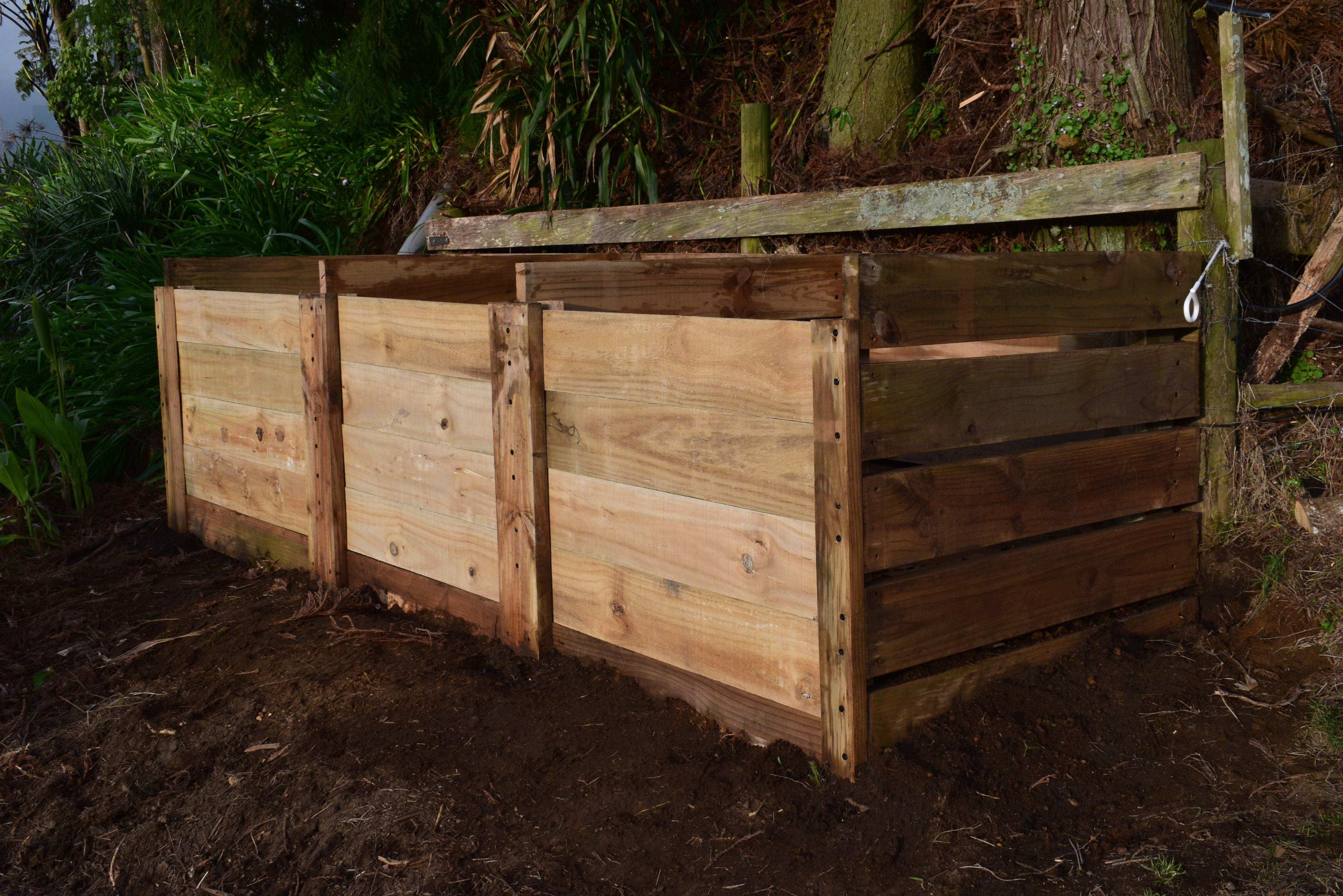 Three bay composting station installed outdoors